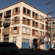 The lofts at 837 Traction Avenue, in sunnier, funnier times (Screenshot: New Girl)